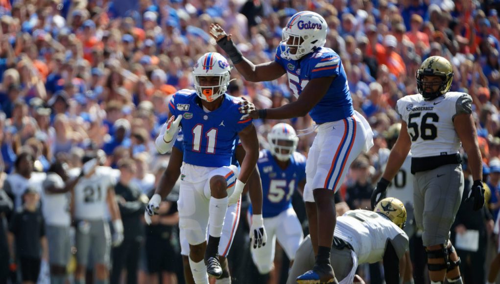 University-of-Florida-defensive-linemen-Mohamoud-Diabate-and-Jon-Greenard-celebrate-Diabate’s-first-of-two-sacks-against-Vanderbilt-Florida-Gators-football-1280x853-1021x580